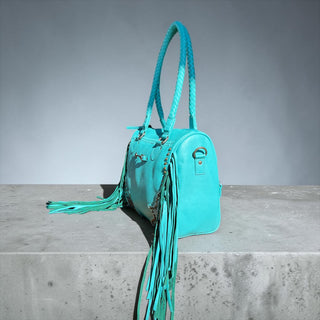Turquoise fringe leather handbag