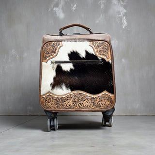 Brown tooled leather & cowhide luggage