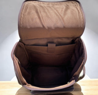 Brown checkered tooled leather & cowhide backpack