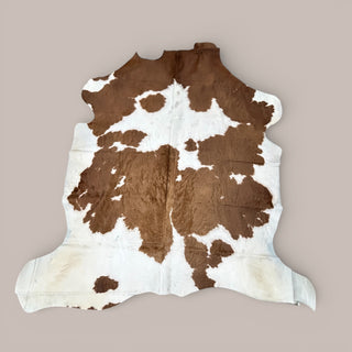 6-7’ Brazilian cowhide rug (L10)