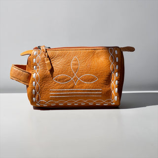 Orange BootStitch toiletry bag