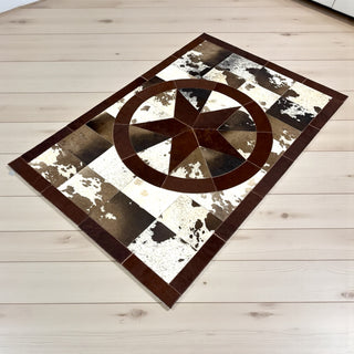 Star cowhide patchwork rug 4x6’