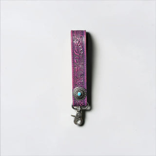 Purple tooled leather wristlet