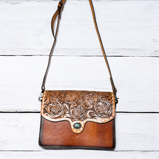 Tooled leather concho crossbody bag