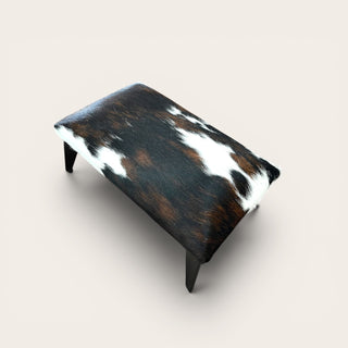 Exact cowhide ottoman