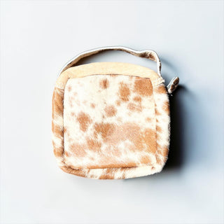 Tan all cowhide makeup bag