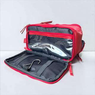 Red tooled leather toiletry bag