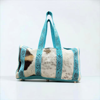 Turquoise tooled leather & cowhide duffle bag