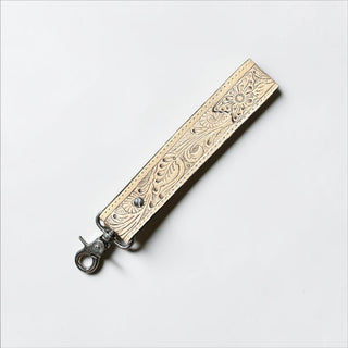 Ivory Concho tooled leather wristlet