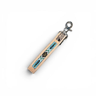 Turquoise Aztec tooled leather wristlet strap