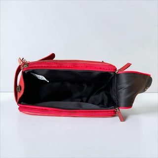 Red tooled leather toiletry bag