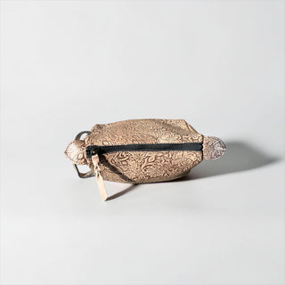 Floral embossed leather makeup bag