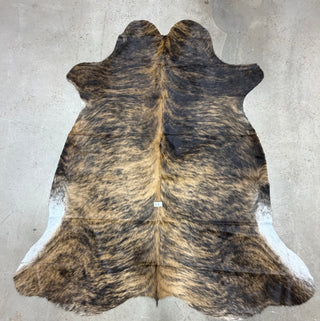 7.1’x5.11’ Brazilian cowhide rug (A8)