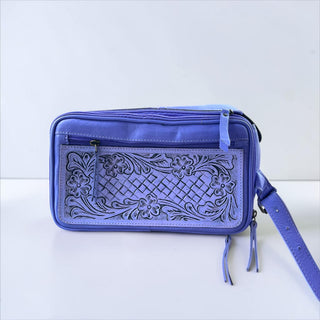 Purple tooled leather toiletry bag