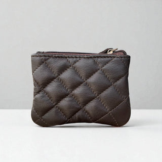 Brown tooled leather coin pouch