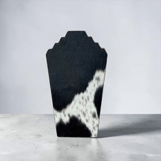Black cowhide necklace display