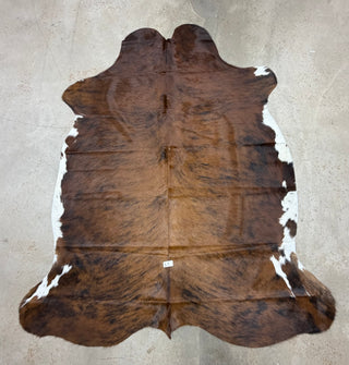 6.9’x5.7’ Brazilian cowhide rug (A9)