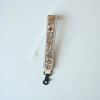 Tan tooled leather wristlet strap