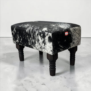 Black/white genuine cowhide ottoman