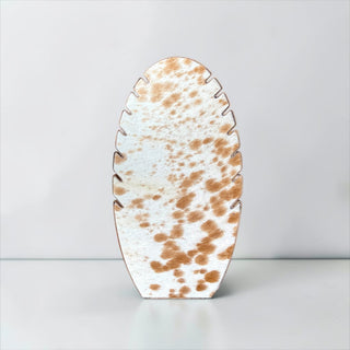 Tan cowhide necklace display