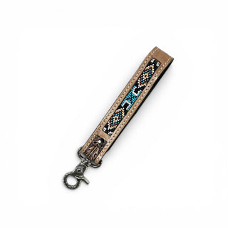 Turquoise aztec tooled leather wristlet strap
