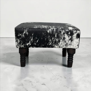 Black/white genuine cowhide ottoman
