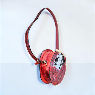 Red tooled leather & cowhide canteen bag
