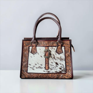 Brown tooled leather buckle crossbody bag