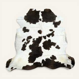 6-7’ Brazilian cowhide rug (i10)