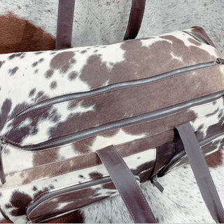 Cowhide Duffle & Rolling Luggage