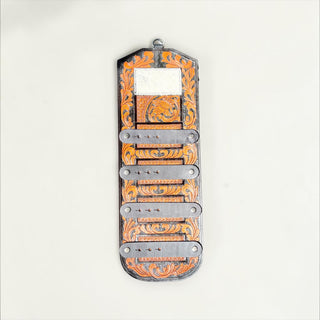 Tan/black tooled leather & cowhide buckle holder