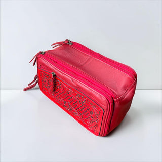 Red tooled leather toiletry bag