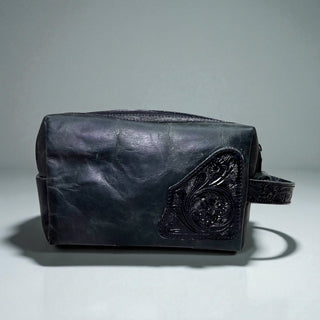 Black tooled leather toiletry bag