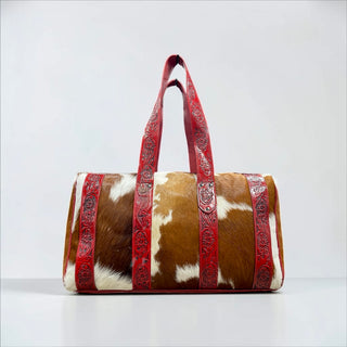 Red tooled leather & cowhide duffle bag