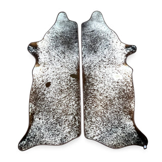 Brown border matching sets 6-7’ cowhide rug