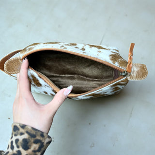Tan all cowhide makeup bag