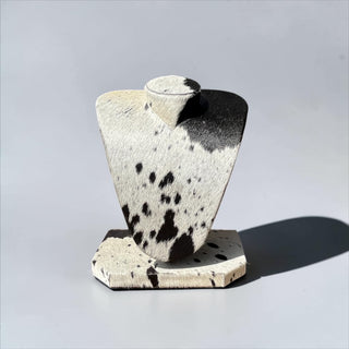 All cowhide necklace display