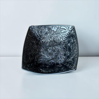 Black floral tooled leather bowl