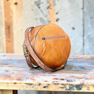 Tan tooled leather & cowhide canteen bag
