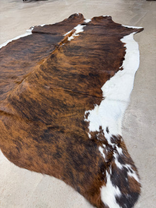 6.8’x5.8’ Brazilian cowhide rug (A13)
