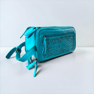 Turquoise tooled leather toiletry bag