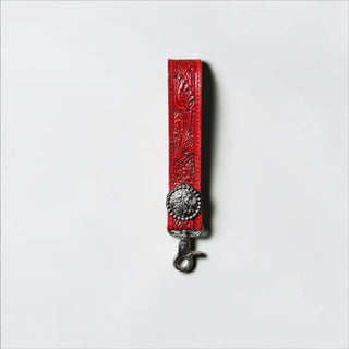 Red tooled leather wristlet