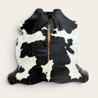 6-7’ Brazilian cowhide rug (r10)