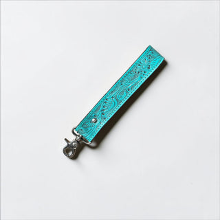 Turquoise tooled leather wristlet