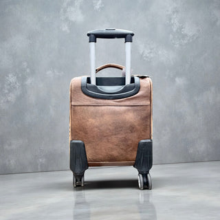 Brown tooled leather & cowhide luggage