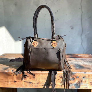 Brown cowhide patchwork fringe handbag