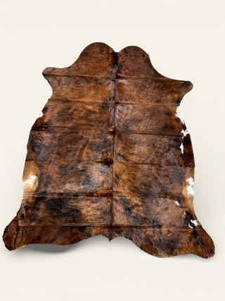 5-6’ Brazilian cowhide rug (b57)