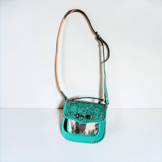 Turquoise horsebit tooled leather & cowhide crossbody bag
