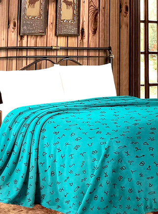 Branding turquoise Mia thin throw blanket