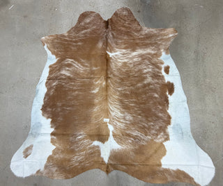 6.6’x6.4’ Brazilian cowhide rug (A10)